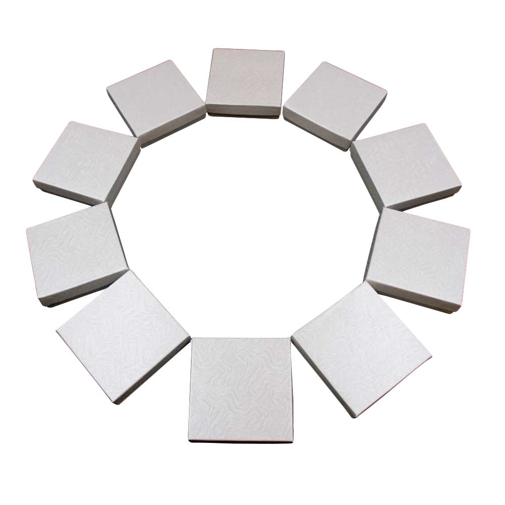 10 White Swirl Cotton Filled Boxes arranged in a circle